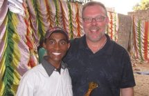 Dr. Greene in India with a local resident. He traveled there with Vitamin Angels.