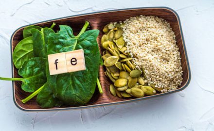 Image of high iron foods -- spinach, pumpkin seeds and sesame seeds. Iron is important to keep from getting anemia..