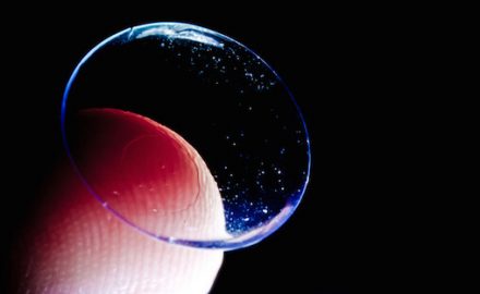 Close up of a contact lens on a finger tip. Photo by Maikel Nai.