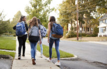 Teenage girls walking to school