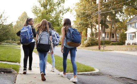 Teenage girls walking to school