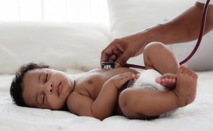 African American baby with breast buds