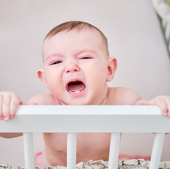 Infant bangs 2024 head on crib